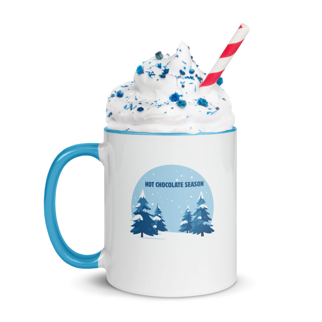 Hot chocolate season white mug with blue interior whipping cream